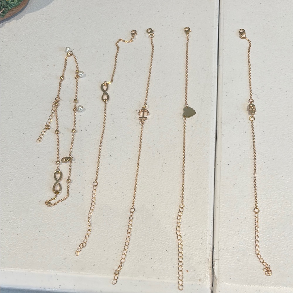 Assorted gold tone ankle bracelets